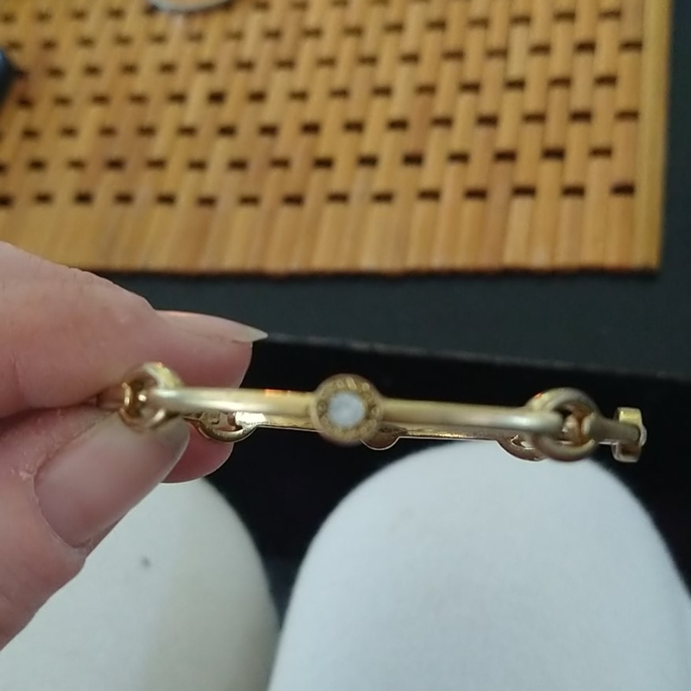 Gold coach bracelet
